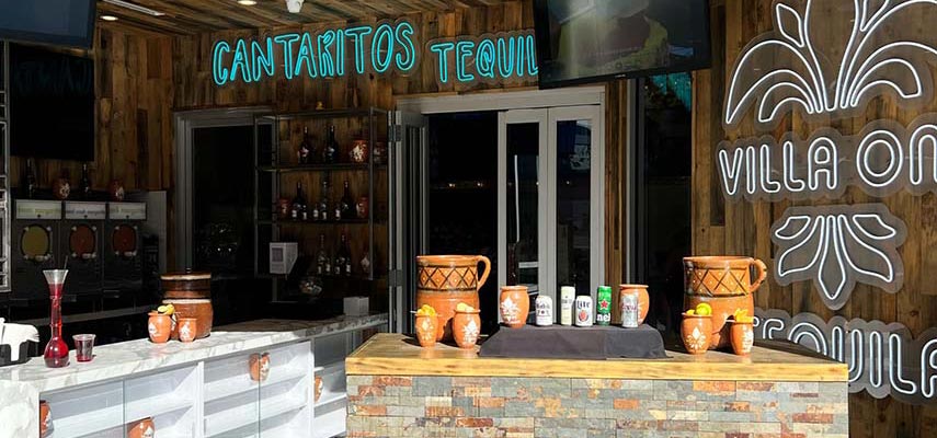 mexican food area with tequila and cantaritos signs