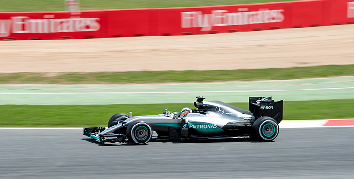 lewis hamilton racing in his mercedes at the spanish grand prix