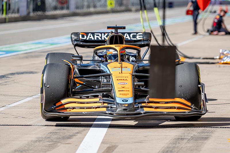 mclaren f1 car heading into the pits at the austin gp 2022
