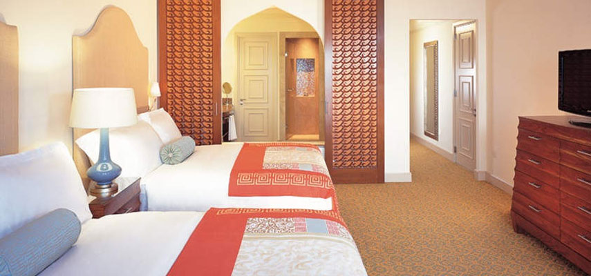 luxury hotel double bedroom with 2 beeds