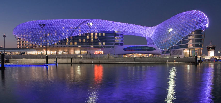 the w-hotel in abu dhabi all lit up in purple