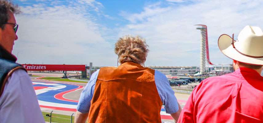 back view of spectators watching the circuit