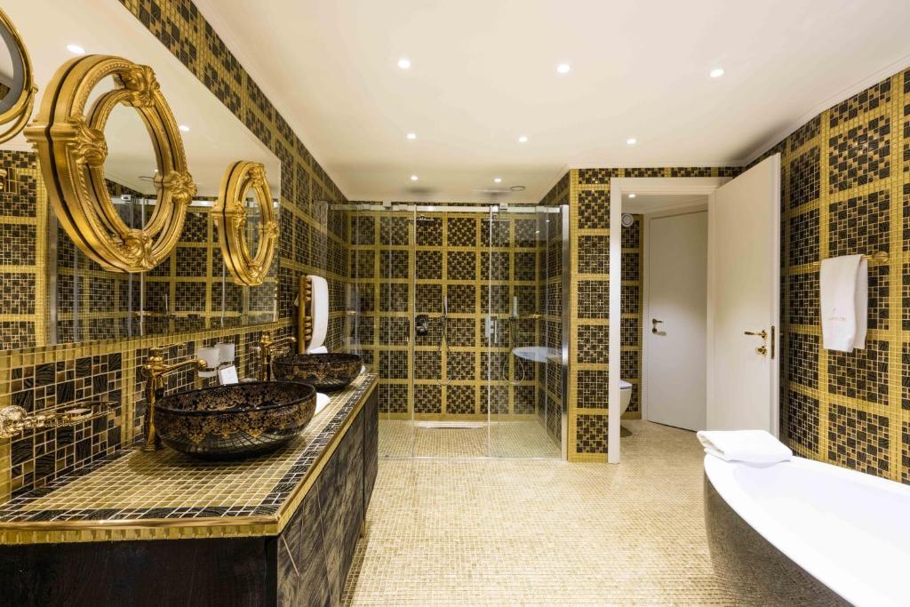 luxury hotel bathroom with bath