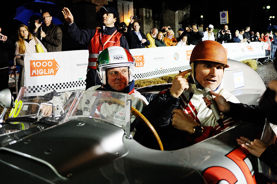 david coulthard and passenger racing a vintage car