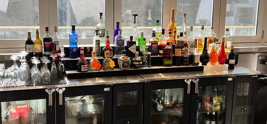 bar with fridges and spirit bottles