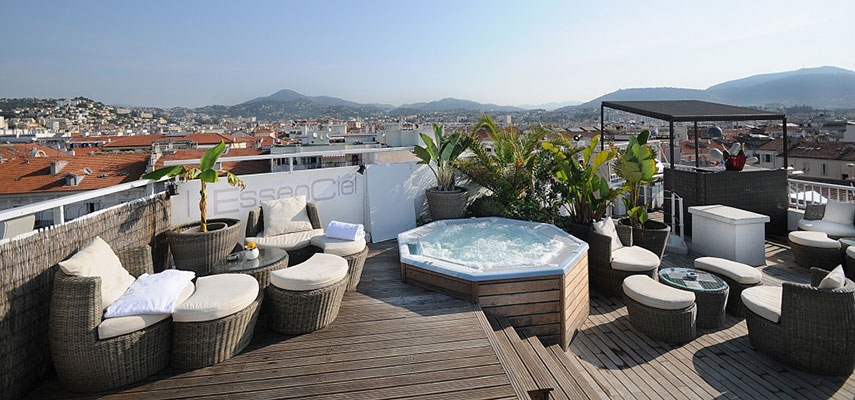rooftop with jacuzzi and seating area