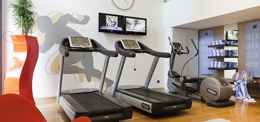 fitness room with running machines