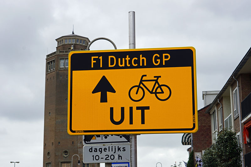 f1 dutch gp sign with bike and arrow symbol