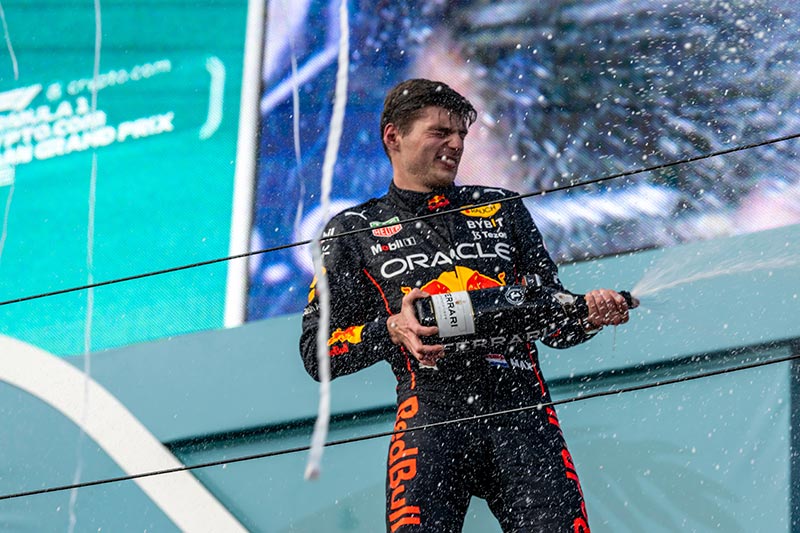 max verstappen f1 driver celebrates with champagne