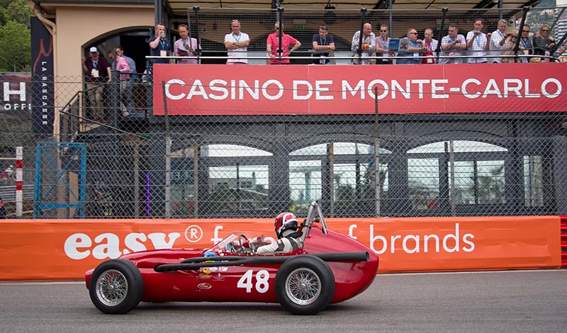 old style red racing car at monaco