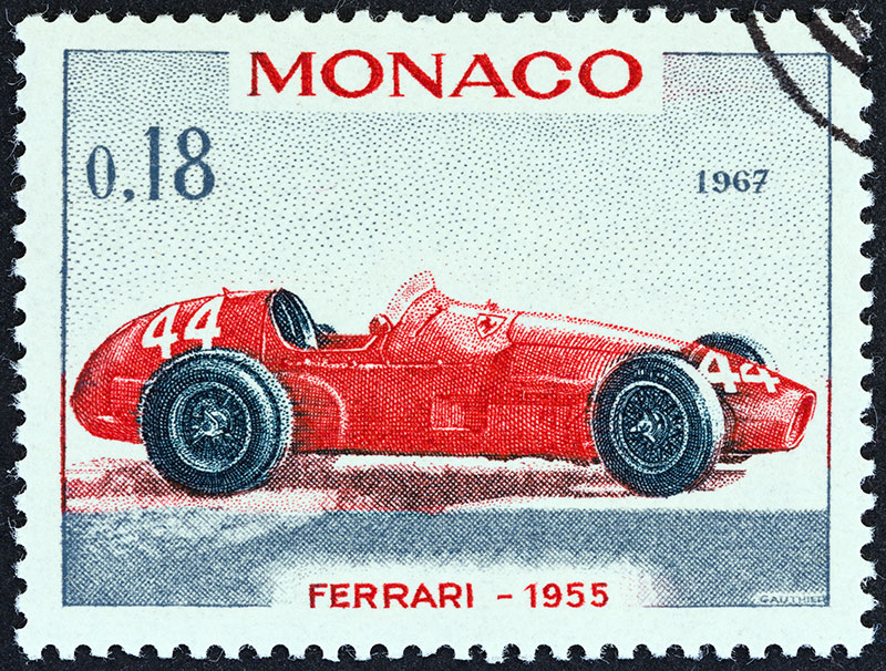 vintage ferrari car on a monaco stamp