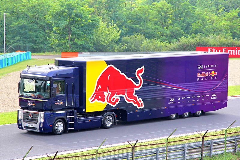 the red bull racing team truck on the road