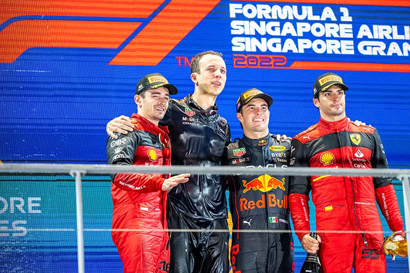 top 3 winning drivers on the podium at the singapore gp 2022