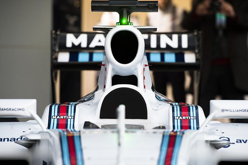 williams f1 car with martini advertising at the back