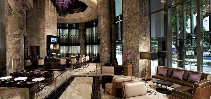 hotel bar and sitting area with large pillars