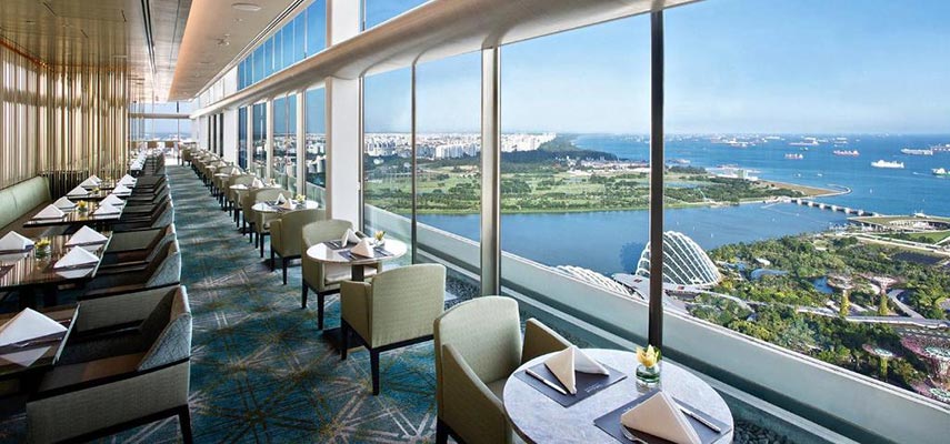 top floor restaurant with views of the sea and the city