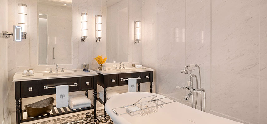 luxury bathroom with 2 sinks and mirrors