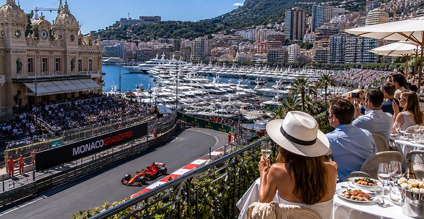 Formula 1 racing at the Monaco Grand Prix with VIP terrace hospitality and yachts in Monte Carlo